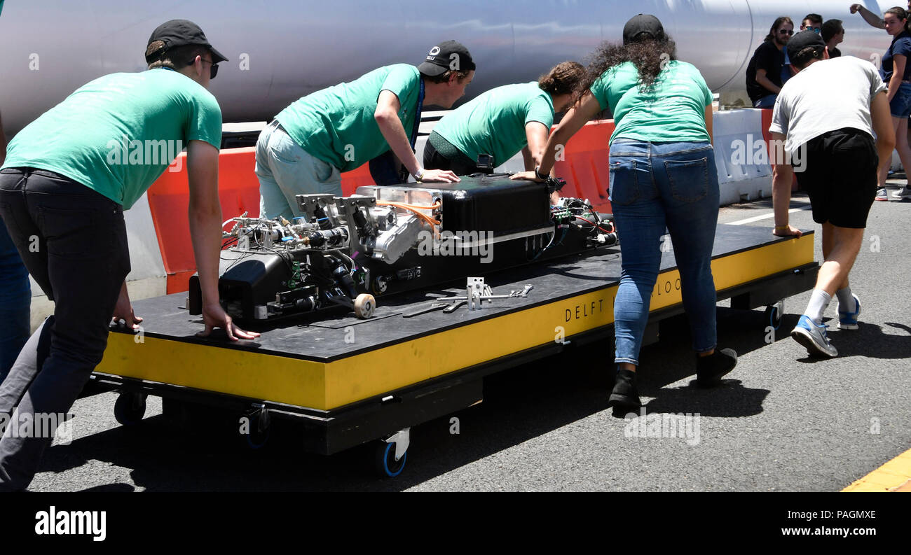 7--22-18. Hawthorne, CA. Team Delft Hyperloop gets their pod back to the  tent as the last of 4 team of 20 student teams comprised of over 600  competitors from more than 40