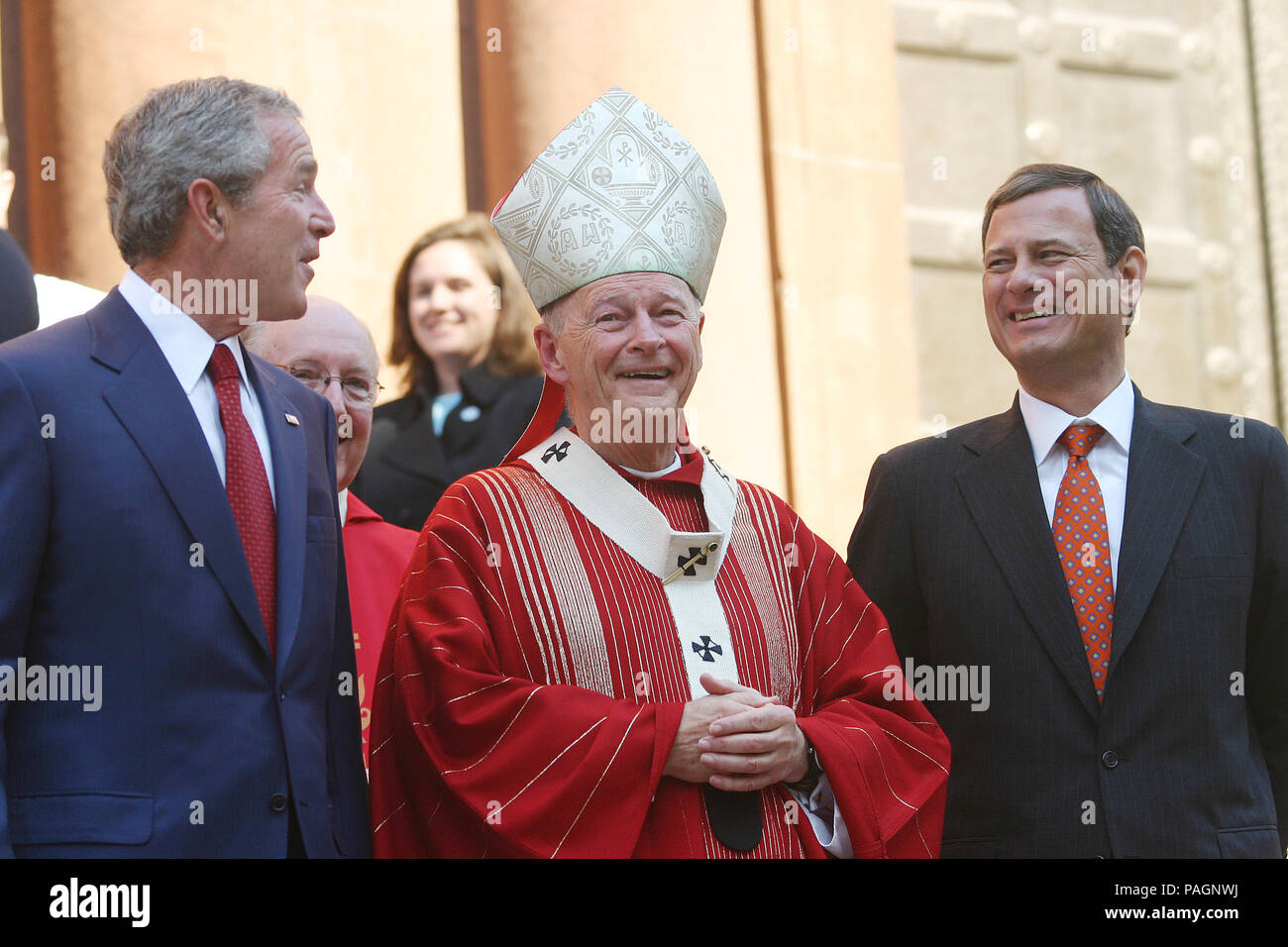 2 October 2005 - Washington, DC - President George W. Bush attends 52nd Annual Red Mass at St. Matthews Cathedral. Red Mass is a tradition that is held the Sunday prior to the Supreme Court's opening session. The service gives special prayers for the court and the judges as they start hearing this session's cases. This mass is special in that the new Chief Justice John Roberts was in attendance along with his wife Jane. First lady Laura Bush was in attendance as well as Secretary of State Condoleezza Rice and White House Chief of Staff Andrew Card. Cardinal Theodore McCarrick, Archbishop Stock Photo