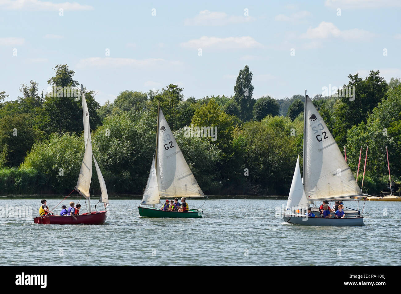 London, UK.  23 June 2018. School children receive sailing lessons during hot weather at Rickmansworth Aquadrome in north west London, on a day when temperatures reached 30C.  Temperatures up to 35C are forecast for the rest of the week during the current heatwave. Credit: Stephen Chung / Alamy Live News Stock Photo