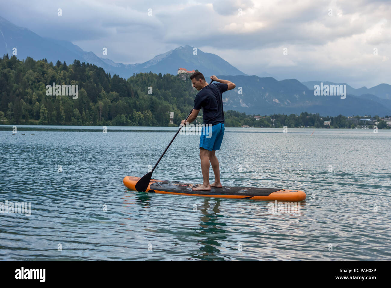 stand up paddle boarding on the lake Bled in Slovenia Stock Photo - Alamy