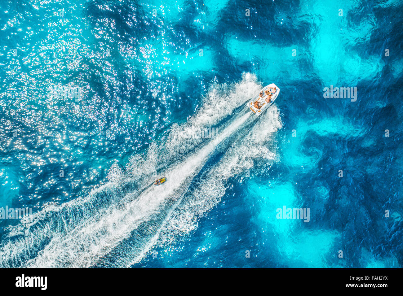 Motorboat at the sea in balearic islands. Aerial view of floating boat ...
