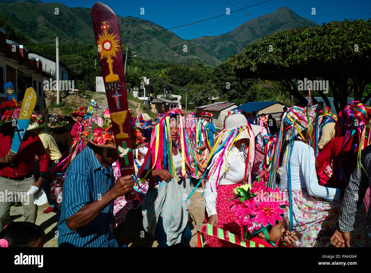 At the foothill of the snow-covered peaks of Sierra Nevada, within the Kankuamo Indians territory, a colorful celebration of the Christian feast of Co Stock Photo