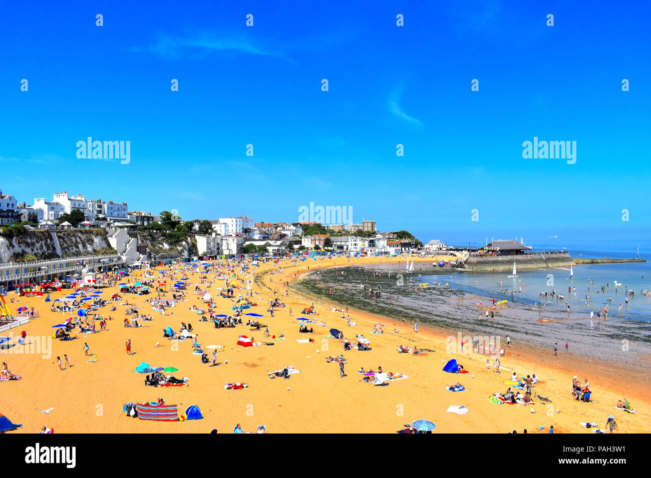 People on the beach in Broadstairs, Kent as the hot weather continues across the UK, July, 2018 Stock Photo
