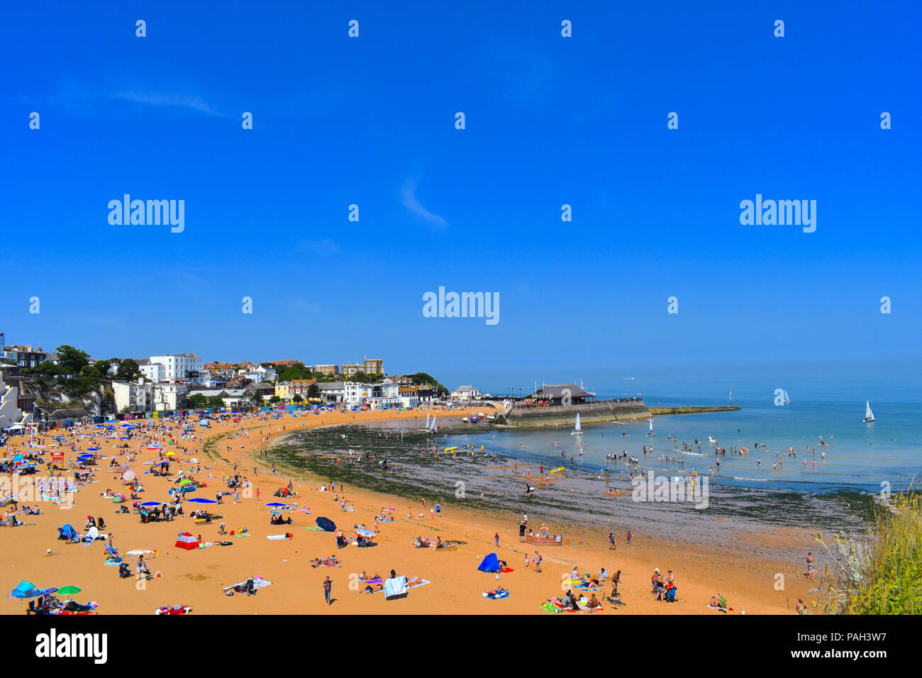 People on the beach in Broadstairs, Kent as the hot weather continues across the UK, July, 2018 Stock Photo