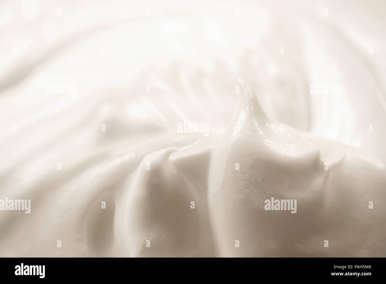 Beaten egg white with the blender Stock Photo Alamy