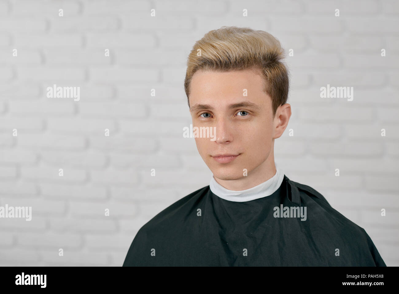 Young Male Model With Blonde Hair Waiting For New Hairstyle