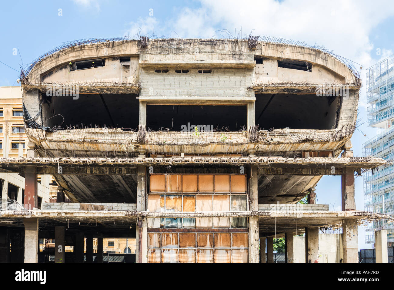 The egg-shaped Dome City Center theater or the 'Egg', abandoned cinema left in ruins after the civil war in Lebanon, Beirut Central District Stock Photo