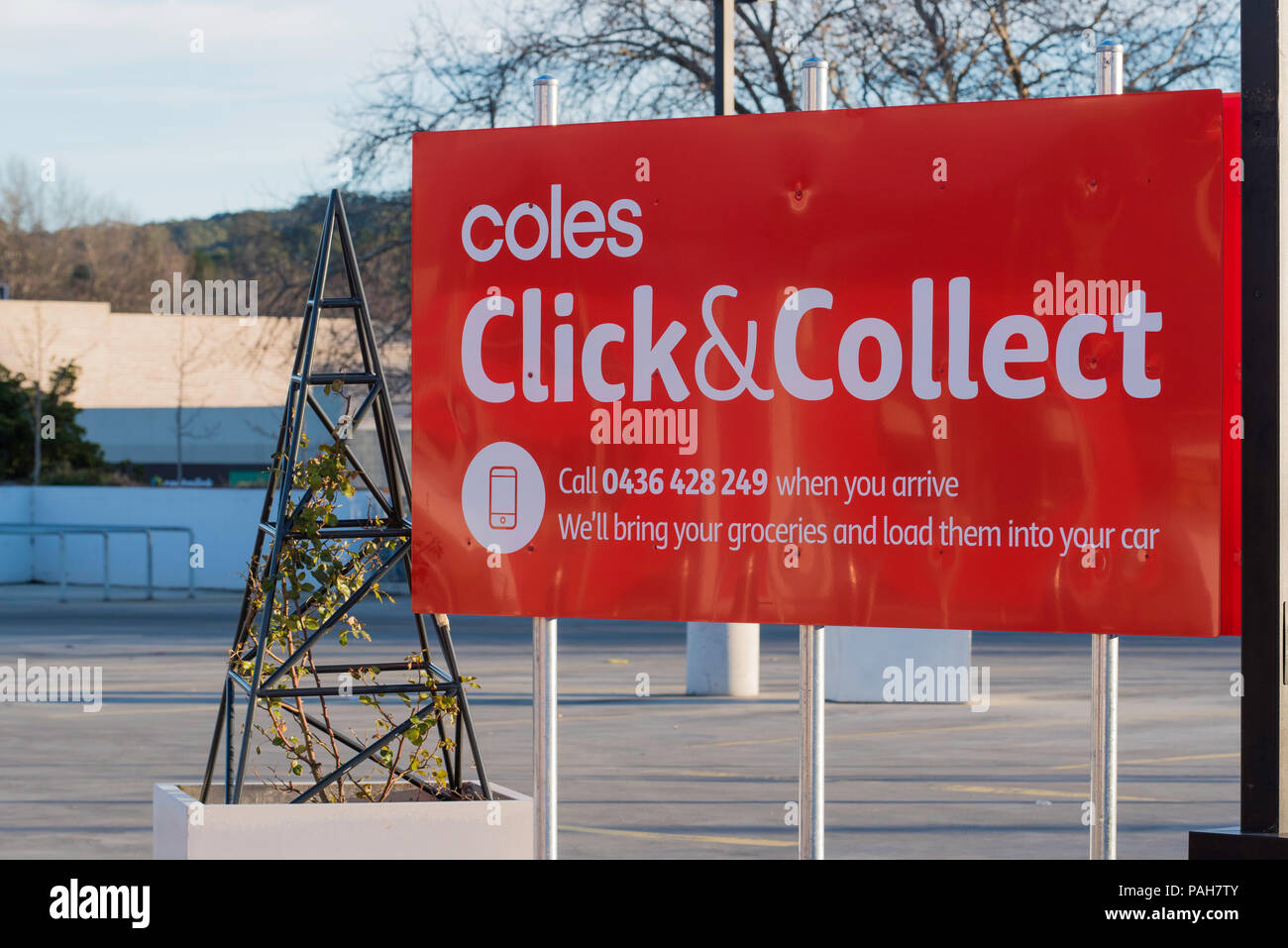 A Coles supermarket Click and Collect sign at a supermarket in Bowral