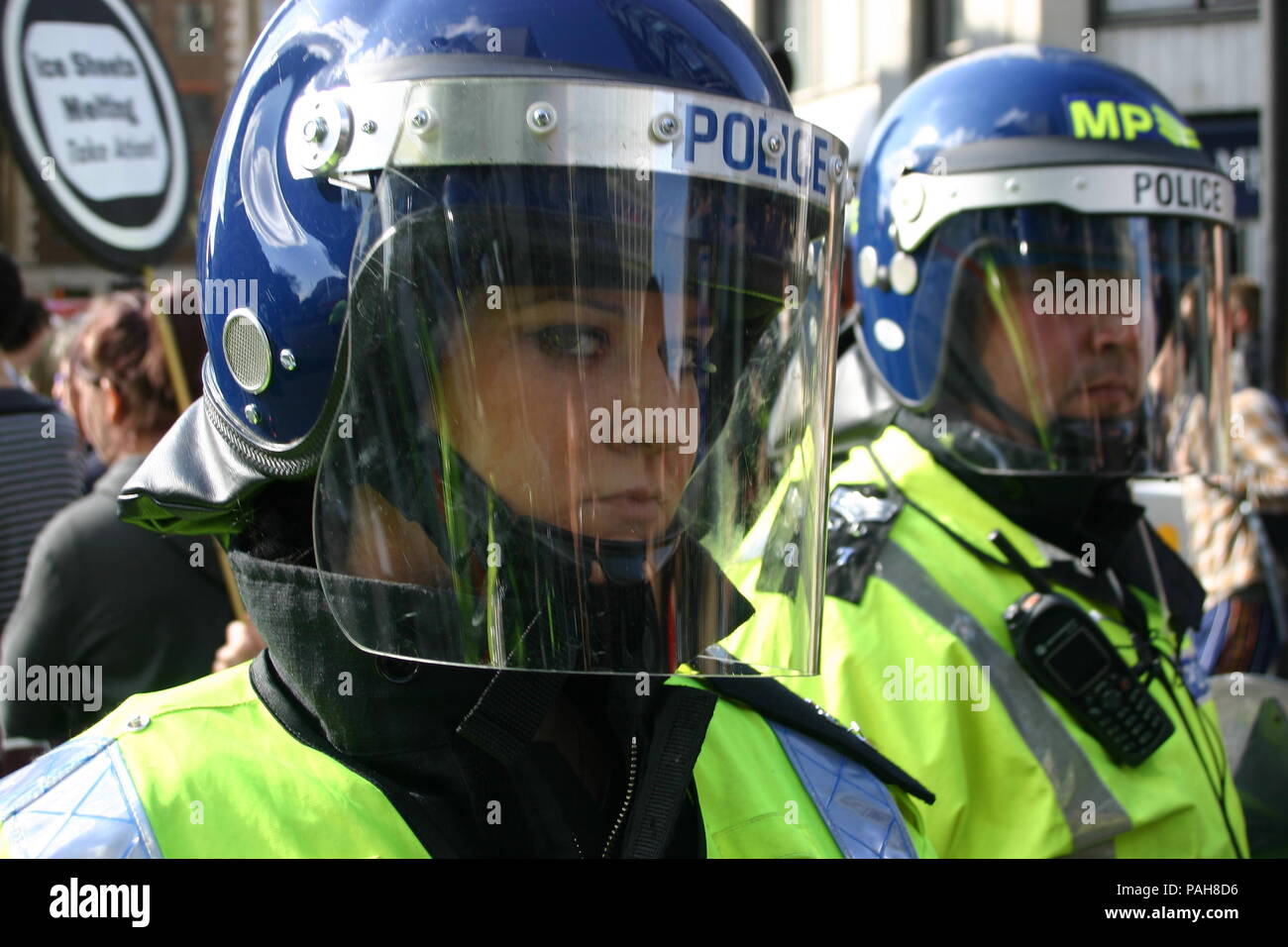 Metropolitan police on duty at a demonstration performing a method of