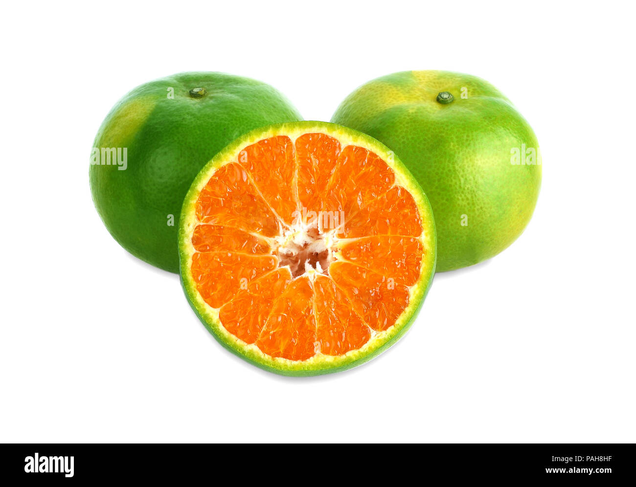 green tangerine isolated on white background Stock Photo Alamy
