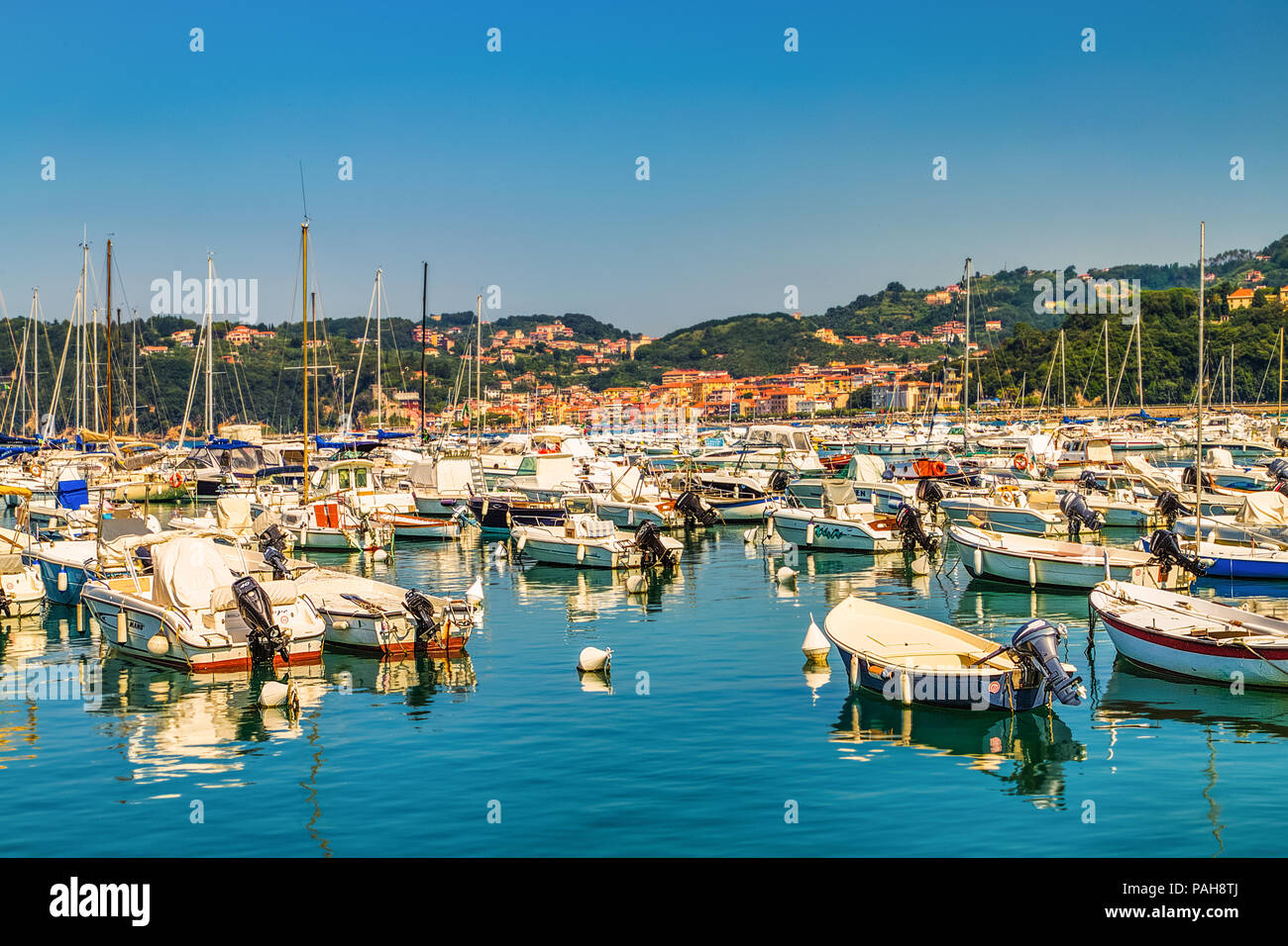LERICI (SP), ITALY - JUNE 21, 2018: The waters are wetting the hulls of the boats in the marina of Lerici Stock Photo