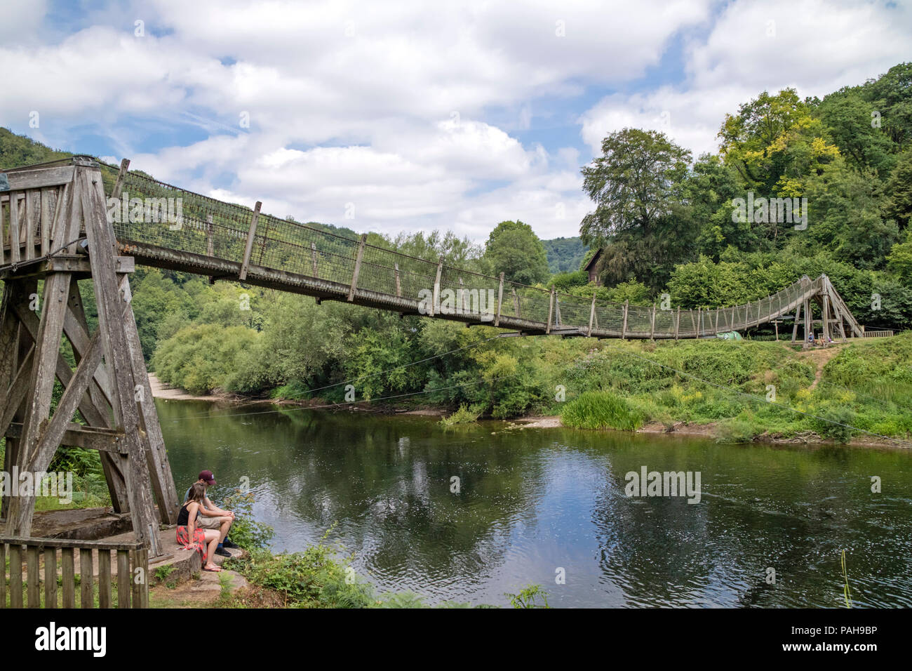Biblins Suspension Bridge looking across to Symonds Yat East over the River Wye, Wye Valley, Herefordshire, England, UK Stock Photo