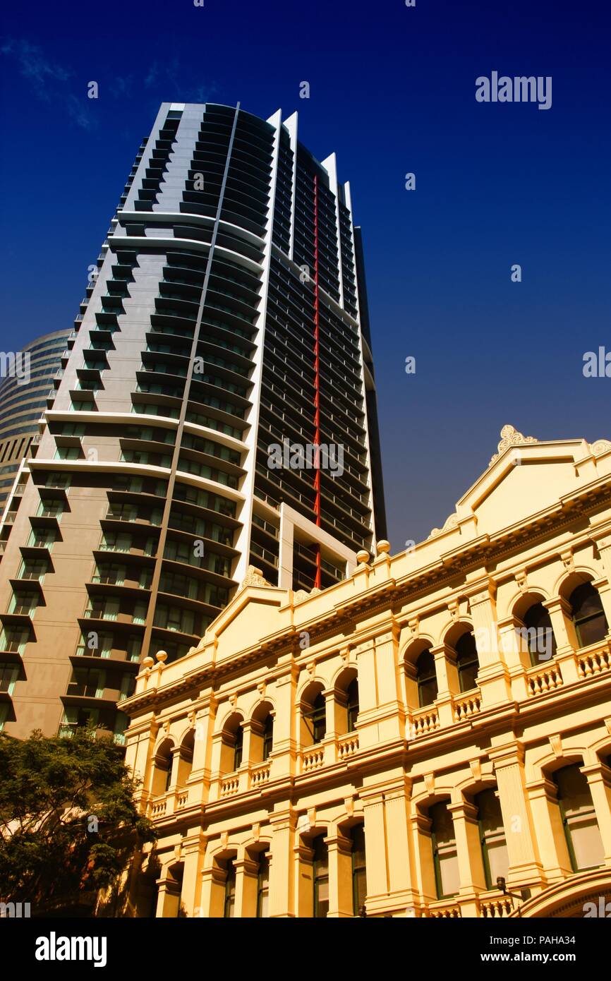 Brisbane, Australia. Modern skyscraper and old architecture. Cross processed color tone - retro filtered style. Stock Photo