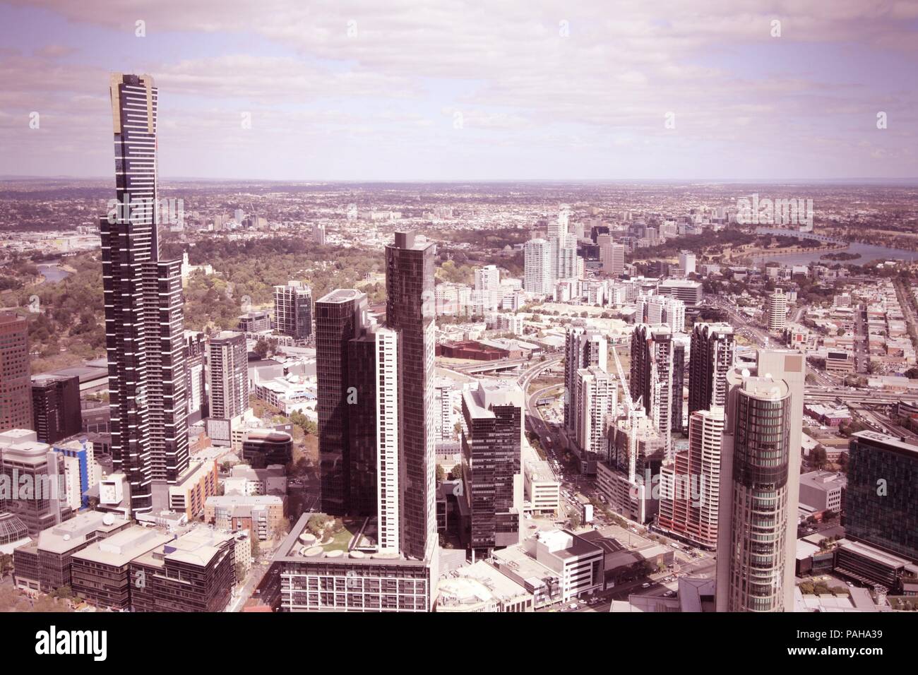 Melbourne, Australia - aerial city view with skyscrapers. Cross processed color tone - retro filtered style. Stock Photo