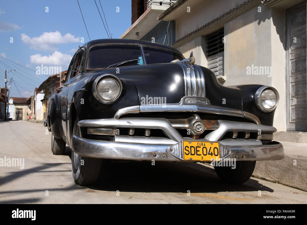 SANCTI SPIRITUS, CUBA - FEBRUARY 6: Classic American Pontiac car in the street on February 6, 2011 in Sancti Spiritus. Recent change in law allows the Stock Photo