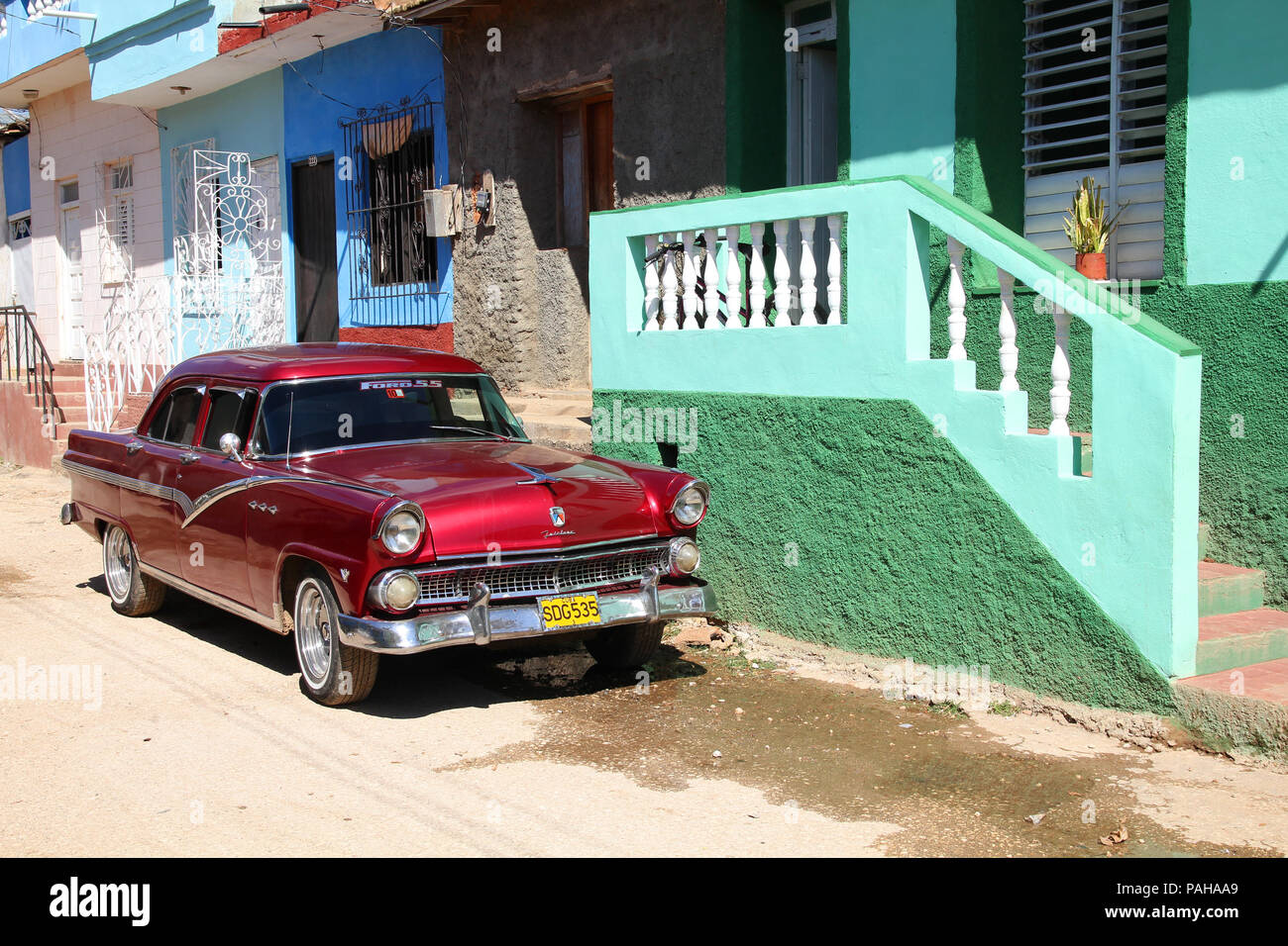 TRINIDAD, CUBA - FEBRUARY 5: Classic American car parked in the street on February 5, 2011 in Trinidad, Cuba. The multitude of oldtimer cars in Cuba i Stock Photo