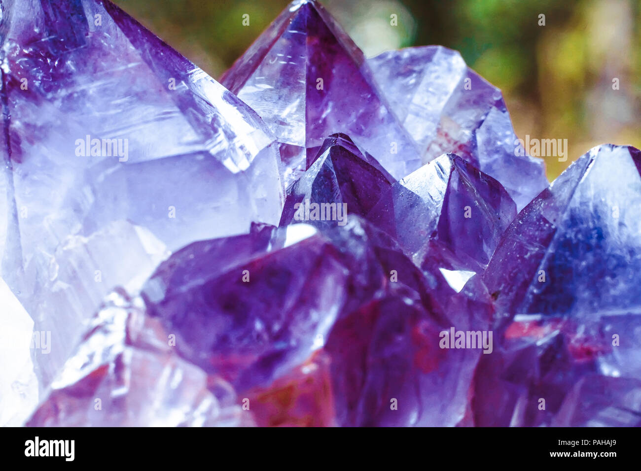 Crystal Stone macro mineral surface, purple rough amethyst quartz crystals Stock Photo Alamy