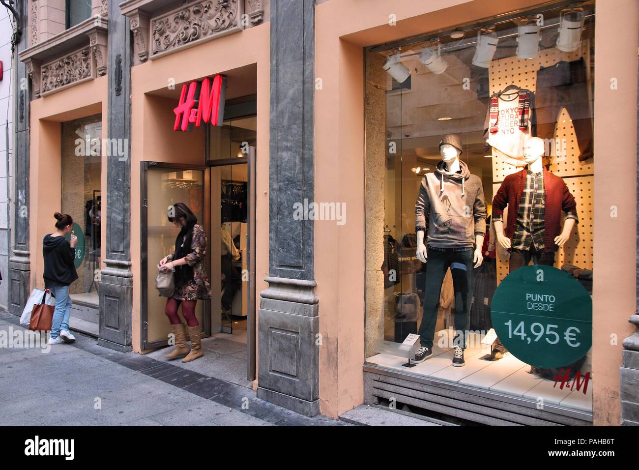 MADRID - OCTOBER 24: People shop at H&M store on October 24, 2012 in  Madrid. H&M is an international fashion retail corp known for its fast  fashion ap Stock Photo - Alamy
