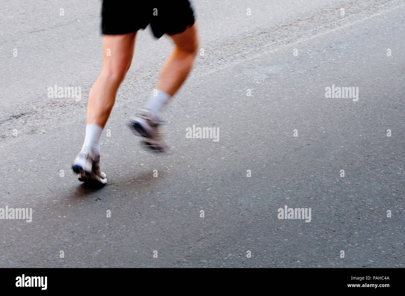 detail of legs of a runner Stock Photo