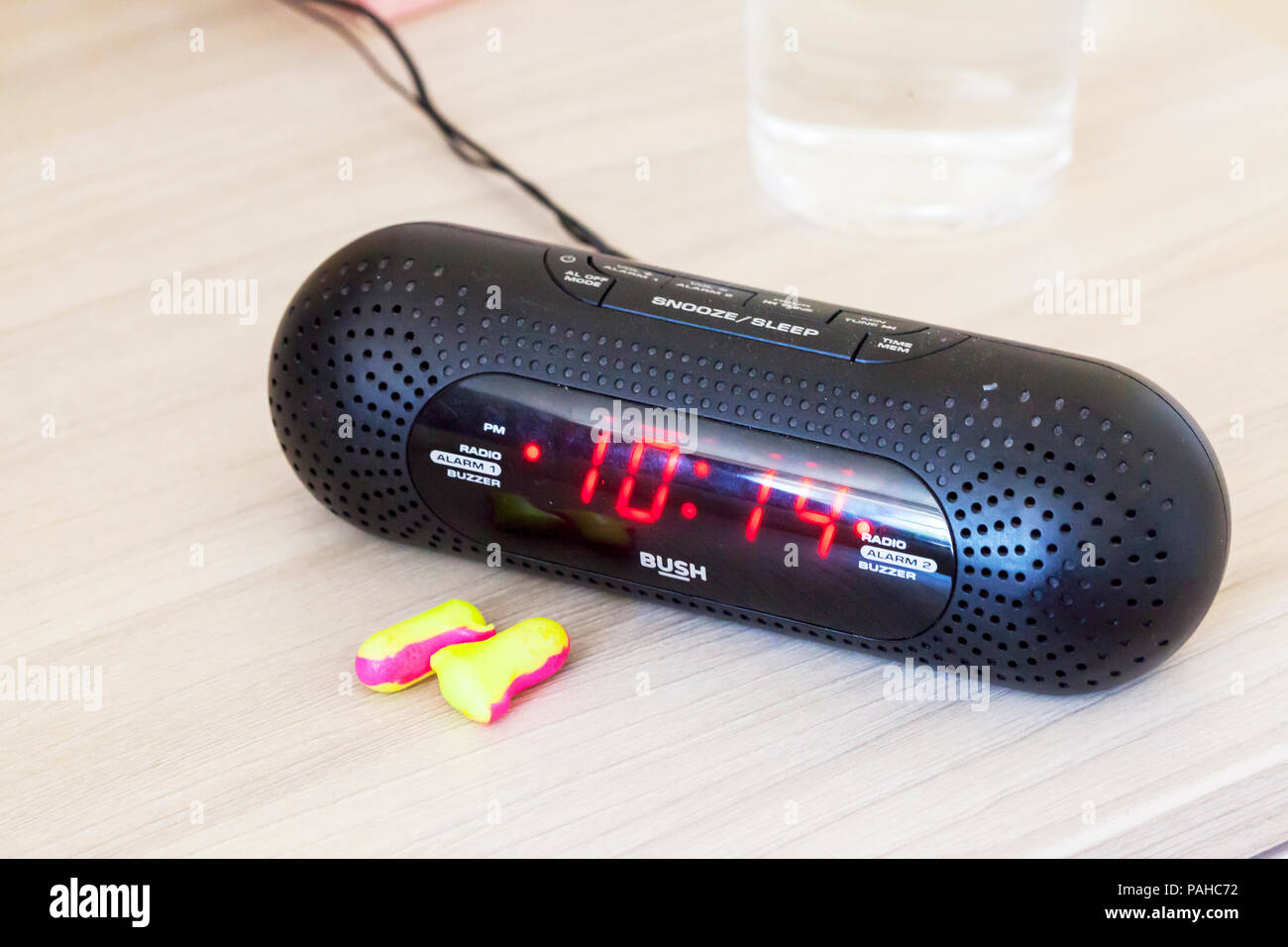Earplugs and alarm clock, clock, earplugs, ear defenders, alarm clock