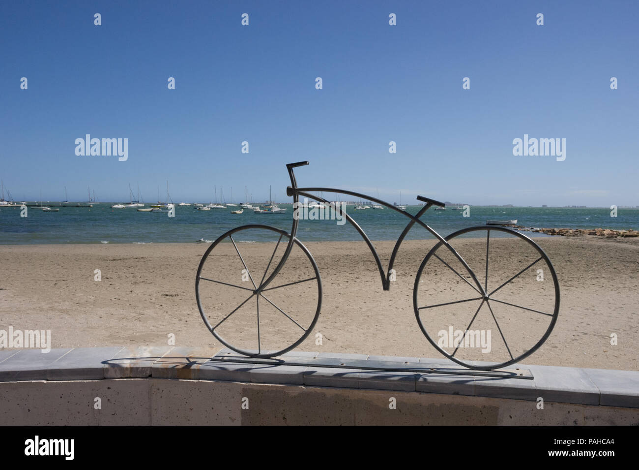 bicycle mounted on a wall in Spain Stock Photo