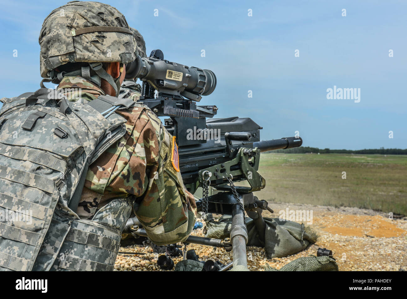 A U.S. Army Reserve Troop List Unit Soldier qualifies with a Mark 19 40 mm grenade machine gun during Operation Cold Steel II, hosted by U.S. Army Civil Affairs and Psychological Operations Command (Airborne), July 13, 2018 at Joint Base McGuire-Dix-Lakehurst, N.J. Operation Cold Steel is the U.S. Army Reserve's crew-served weapons qualification and validation exercise to ensure America's Army Reserve units and Soldiers are trained and ready to deploy on short notice as part of Ready Force X and bring combat-ready and lethal firepower in support of the Army and our joint partners anywhere arou Stock Photo