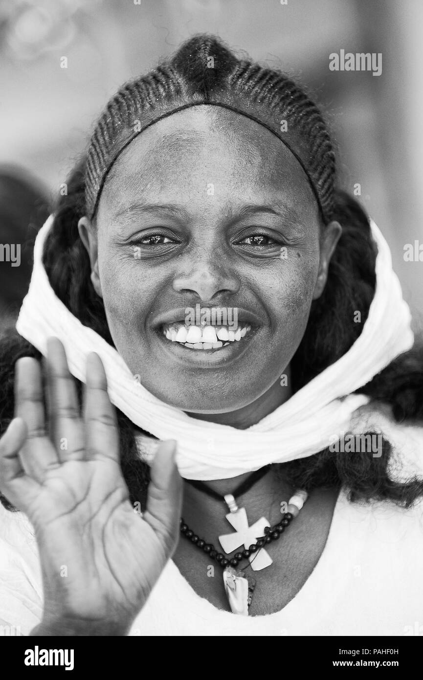 AKSUM, ETHIOPIA - SEP 24, 2011: Unidentified Ethiopian beautiful girl wearing white tissue in Ethiopia, Sep.24, 2011. Children in Ethiopia suffer of p Stock Photo