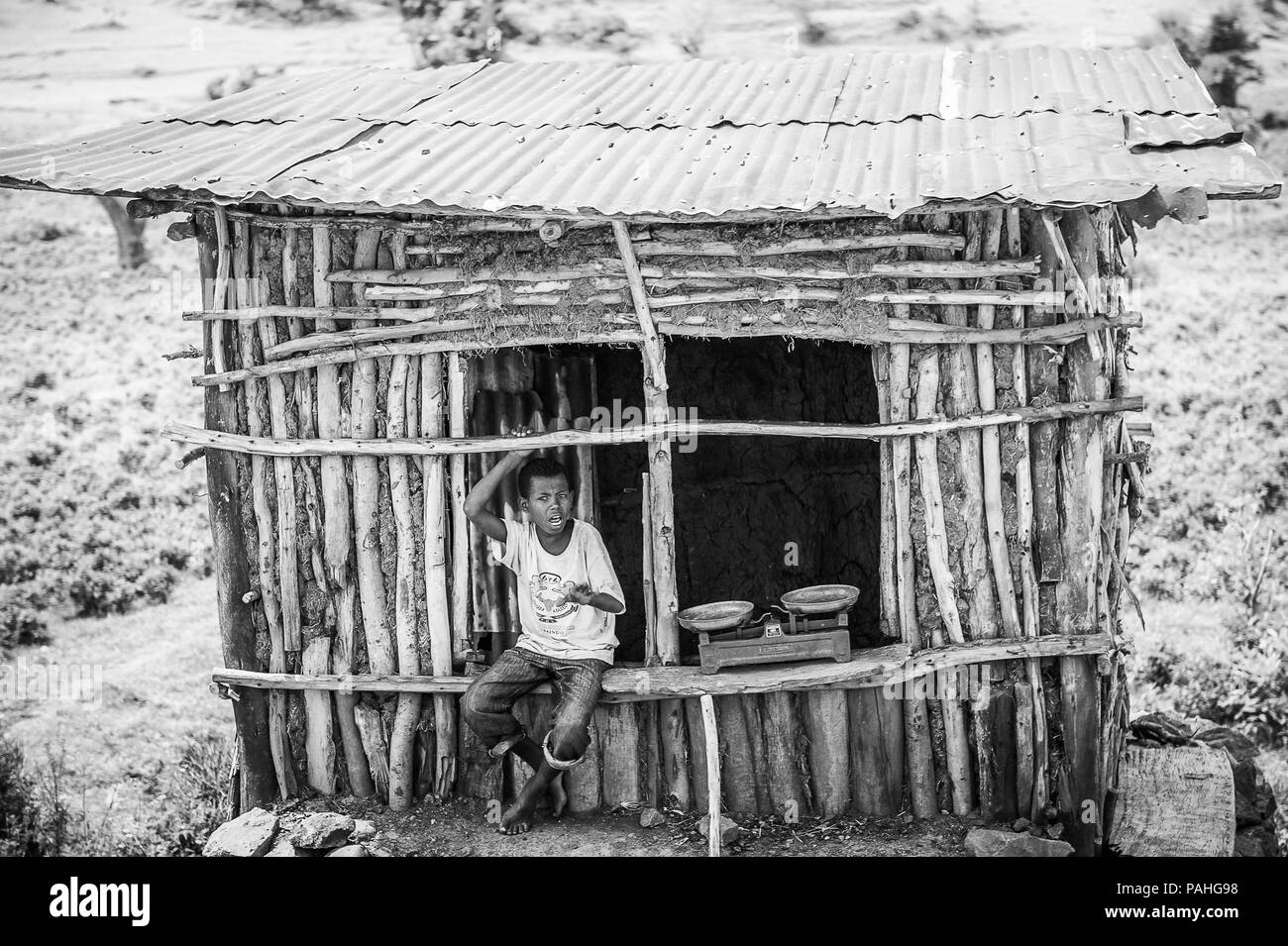 Africa poor wooden house poverty Black and White Stock Photos & Images ...