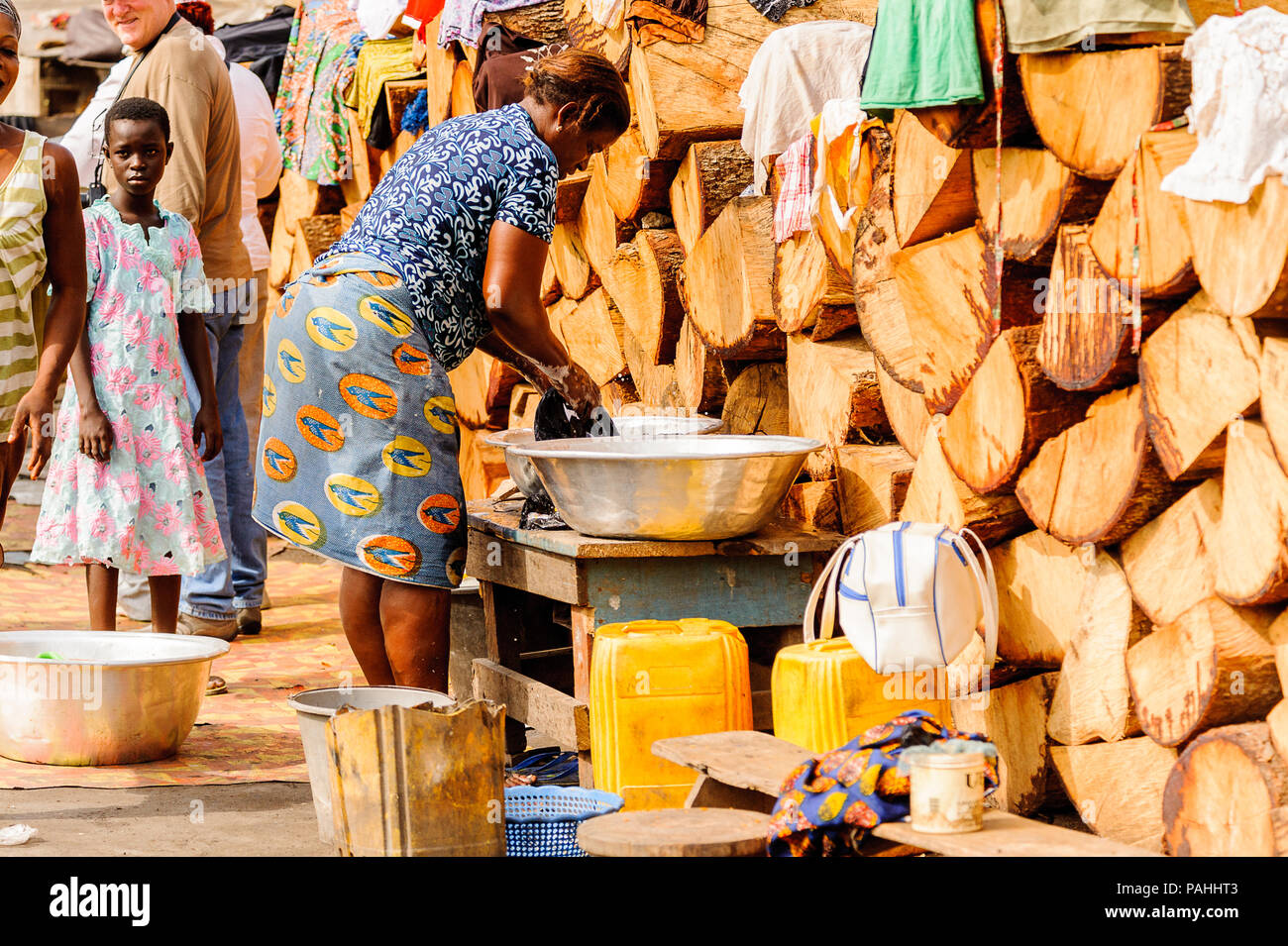 GHANA MARCH 2, 2012 Unindentified Ghanaian woman washes the clothes