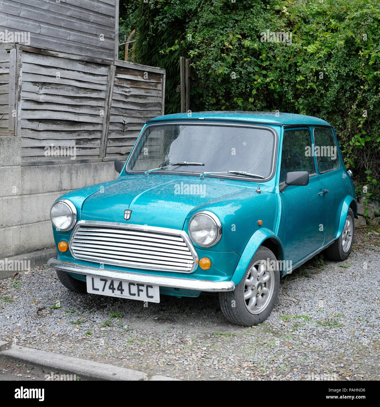 June 2018 - Classic original Mini in very bright blue with alloy wheels Stock Photo