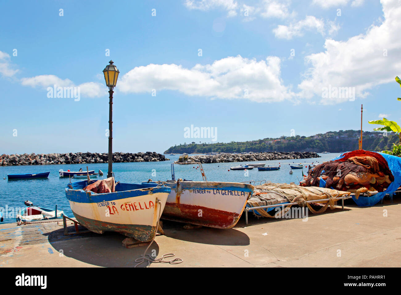 PROCIDA MAY 2013 - Small wooden boats moored at the marina. Marina Corricella, Procida Island, May 11, 2013 Bay of Naples, Campania, Italy Stock Photo