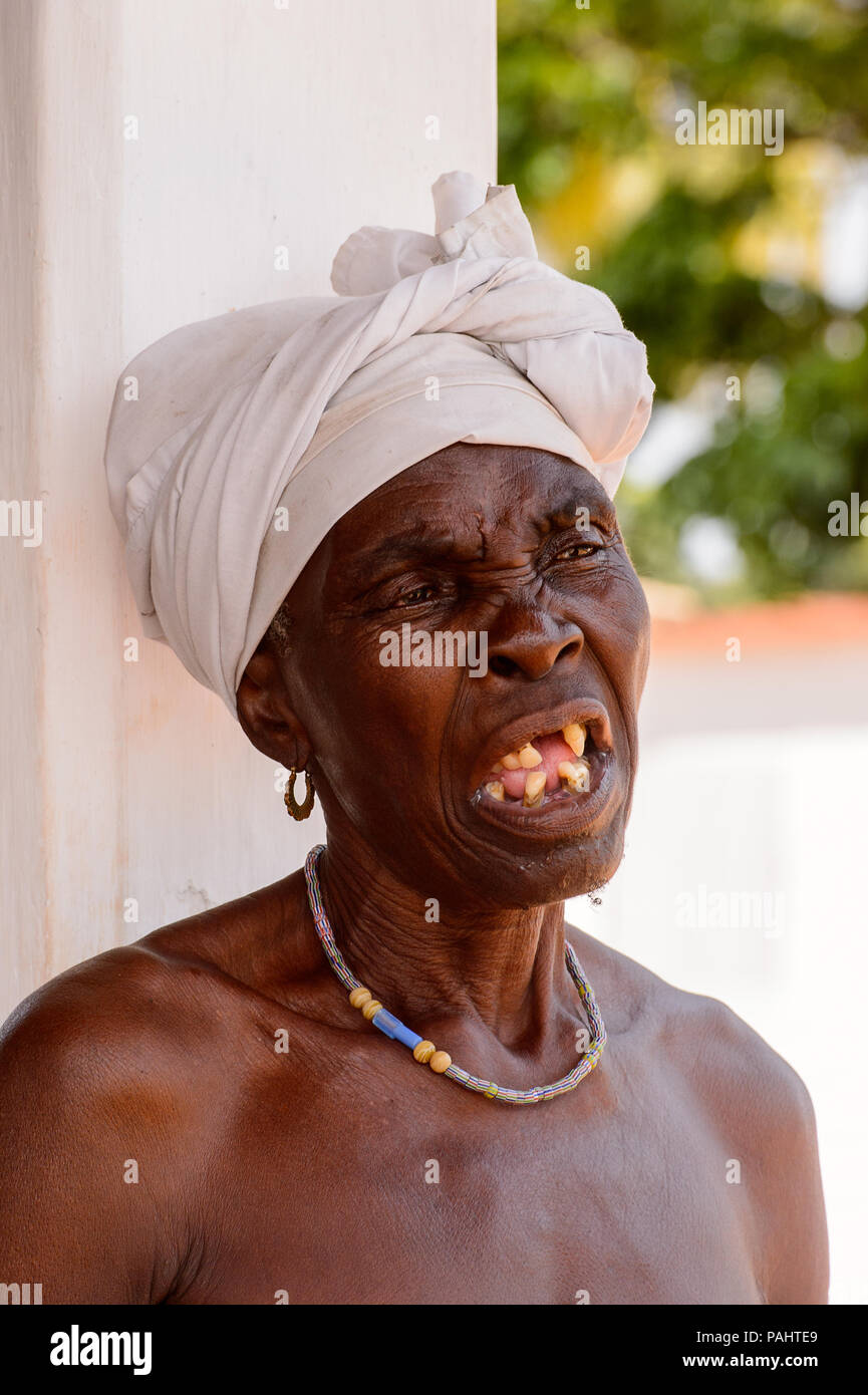 KARA, TOGO - MAR 9, 2013: Unidentified Togolese angry toothless woman portrait. People in Togo suffer of poverty due to the unstable econimic situatio Stock Photo