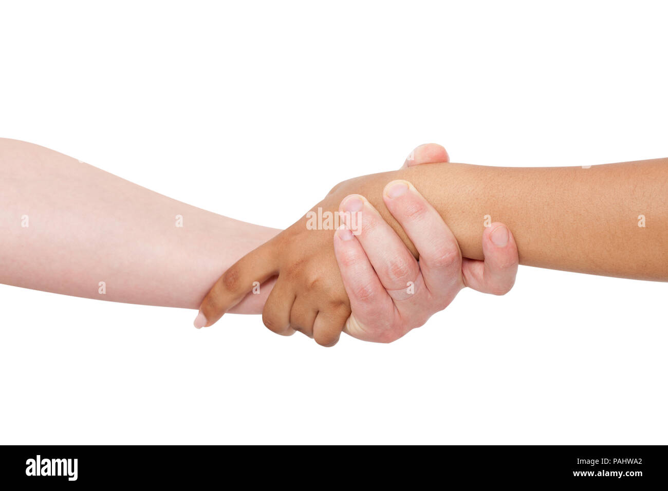 Holding hands couple of a mixed race on white background. Stock Photo