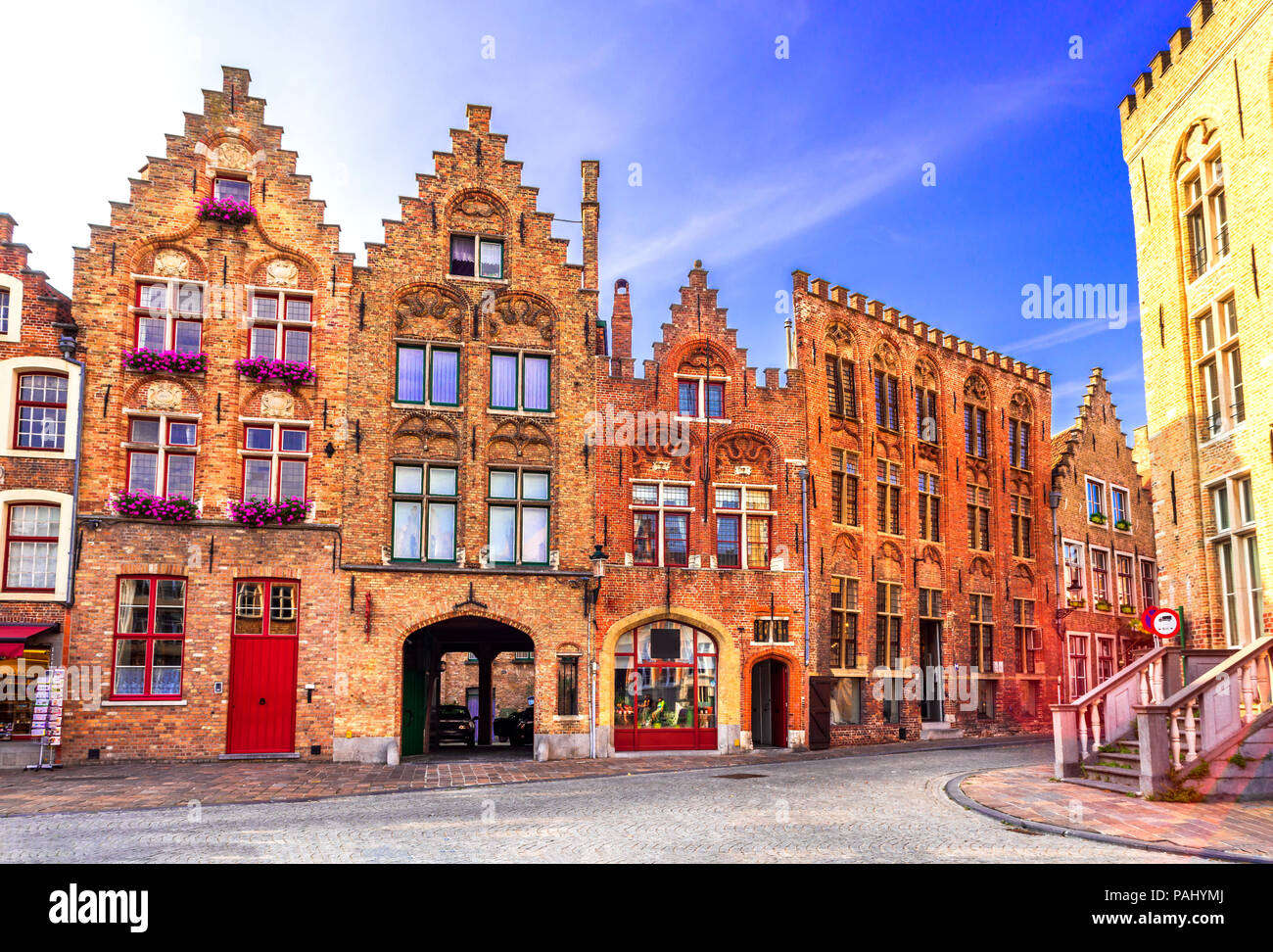 Bruges, twilight image with Hanseatic medieval square of Brugge old Flanders gothic city in Belgium. Stock Photo