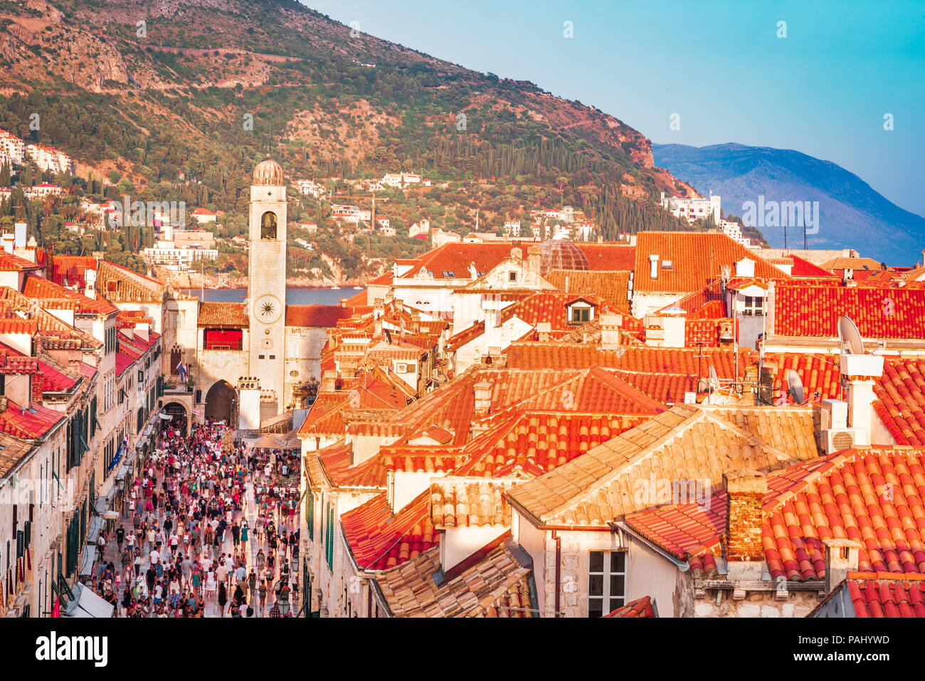 Dubrovnik, Croatia. Sunset golden light over Old Town roofs of Ragusa, Stradum touristic area. Stock Photo