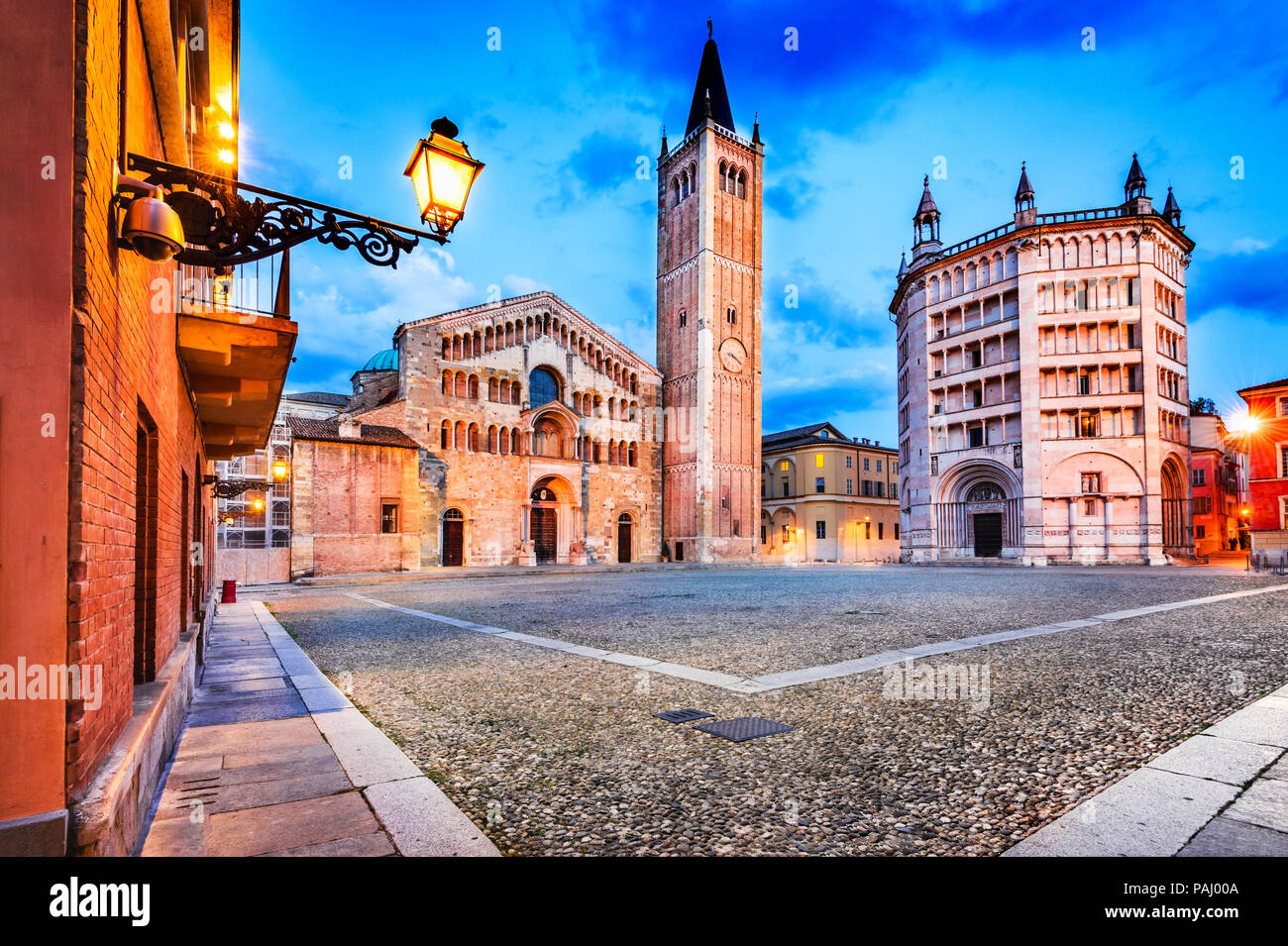 Parma, Italy - Piazza del Duomo with the Cathedral and Baptistery, built in 1059. Romanesque architecture in Emilia-Romagna. Stock Photo