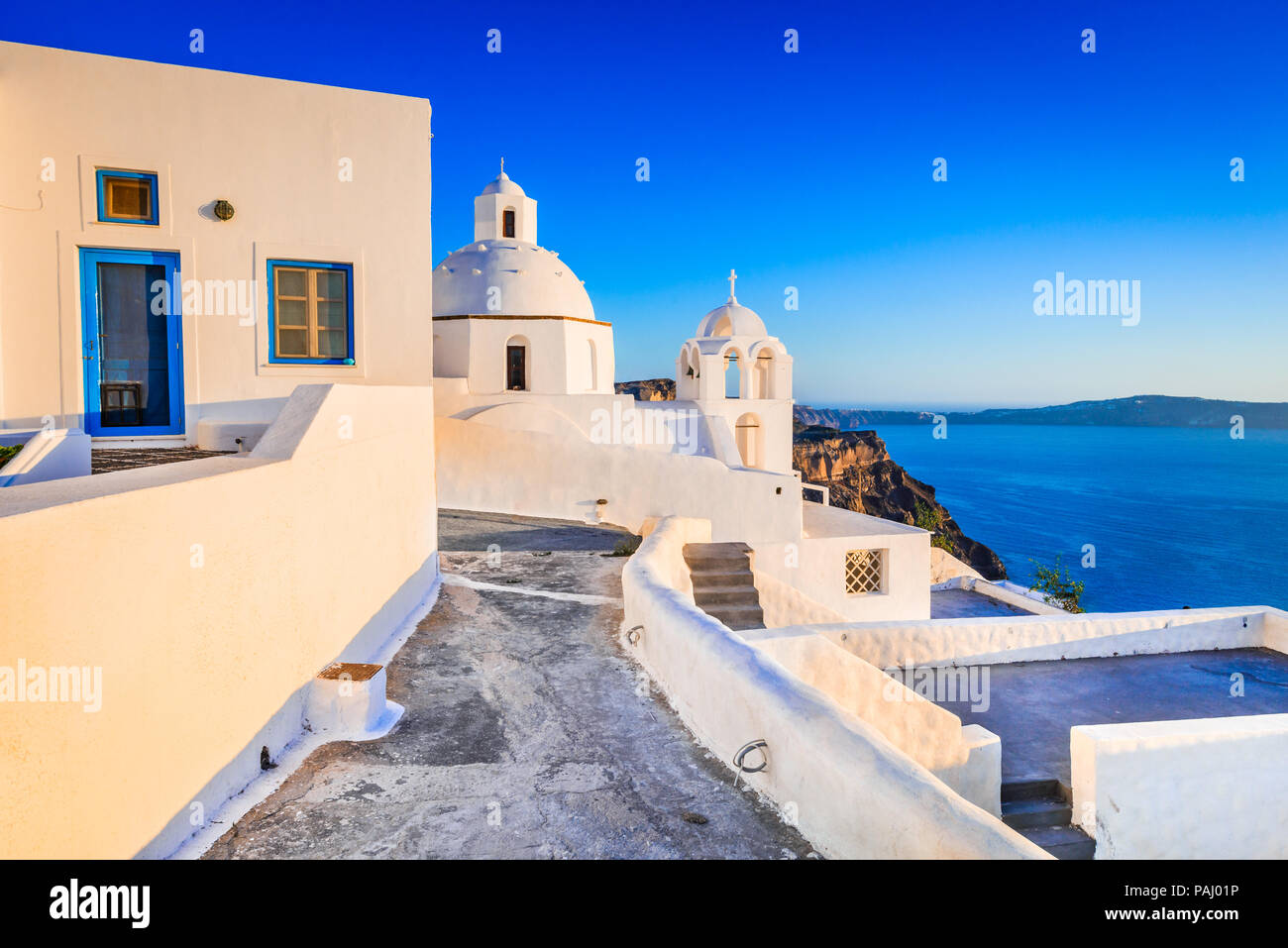 Santorini, Greece. Fira, with old greek church and caldera at Aegean Sea, Thira. Stock Photo