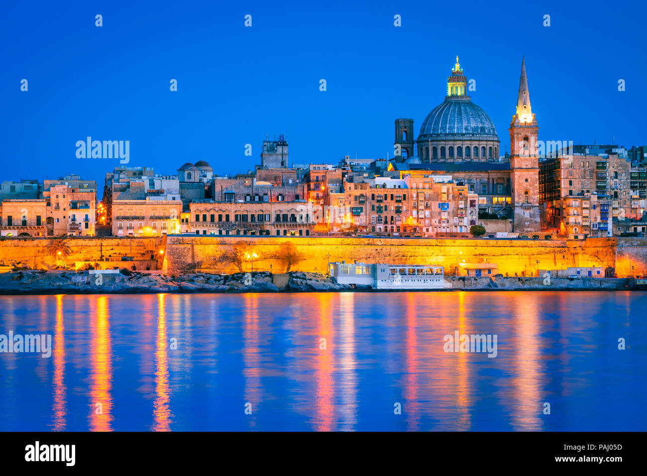 Valletta, Malta, skyline from Marsans Harbour at twilight. Stock Photo