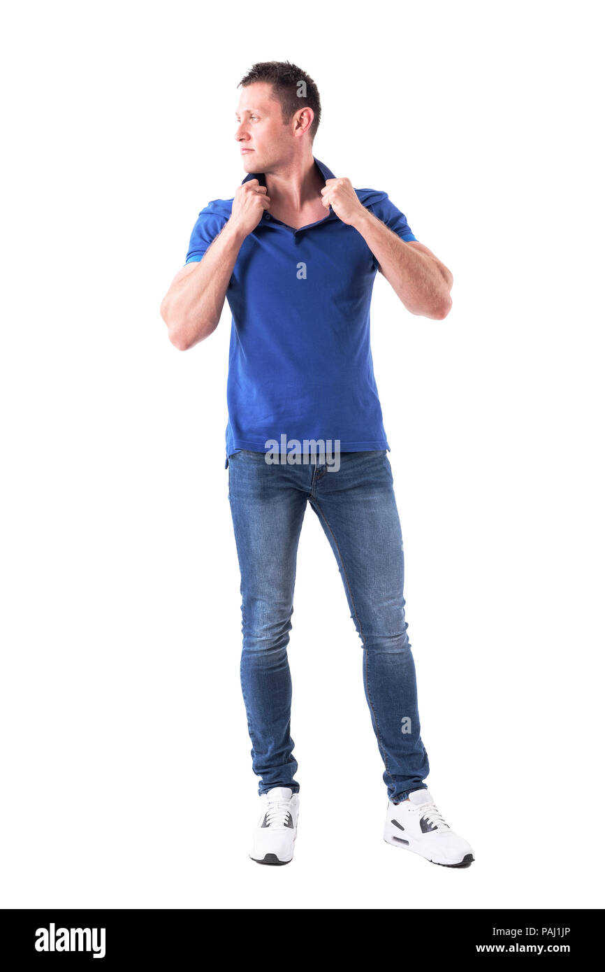 Confident serious handsome macho male fashion model posing and looking away. Full body isolated on white background. Stock Photo