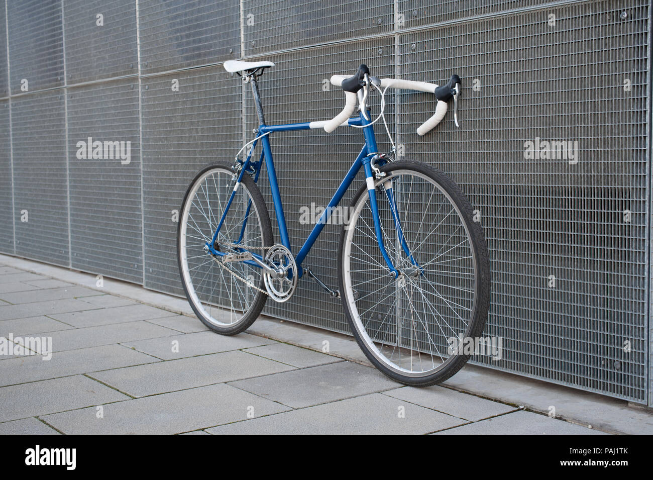 Vintage blue city, road bicycle with white details. Stock Photo