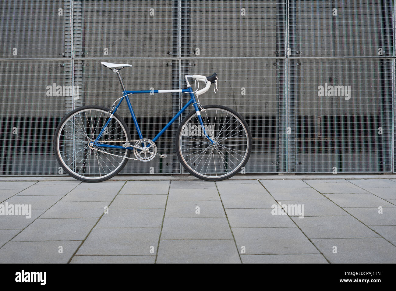 Vintage blue city, road bicycle with white details Stock Photo - Alamy