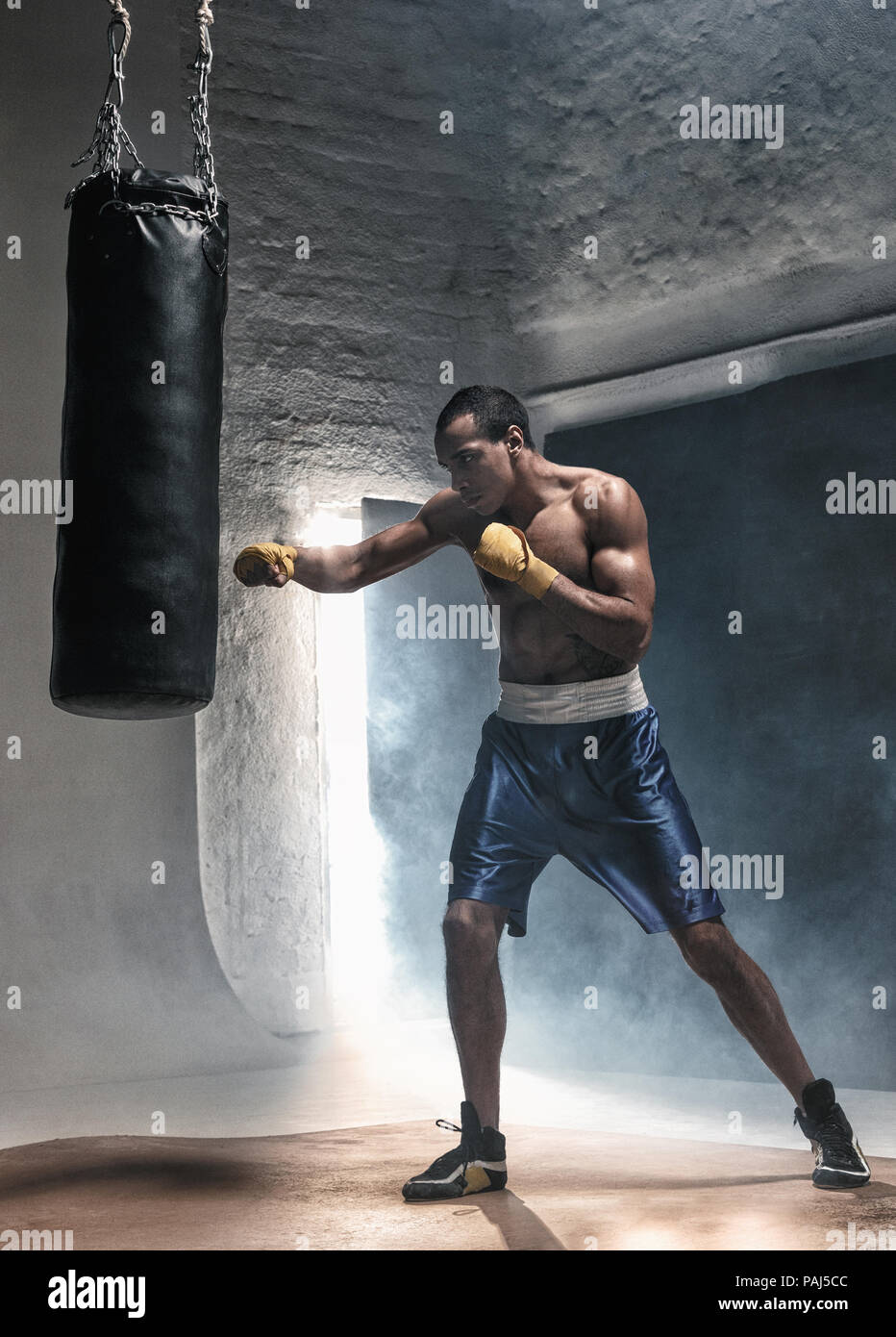 Boxing training and punching bag Stock Photo Alamy