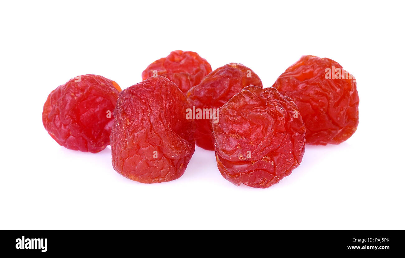 Dried preserved chinese plum or dried fruits on white background Stock Photo