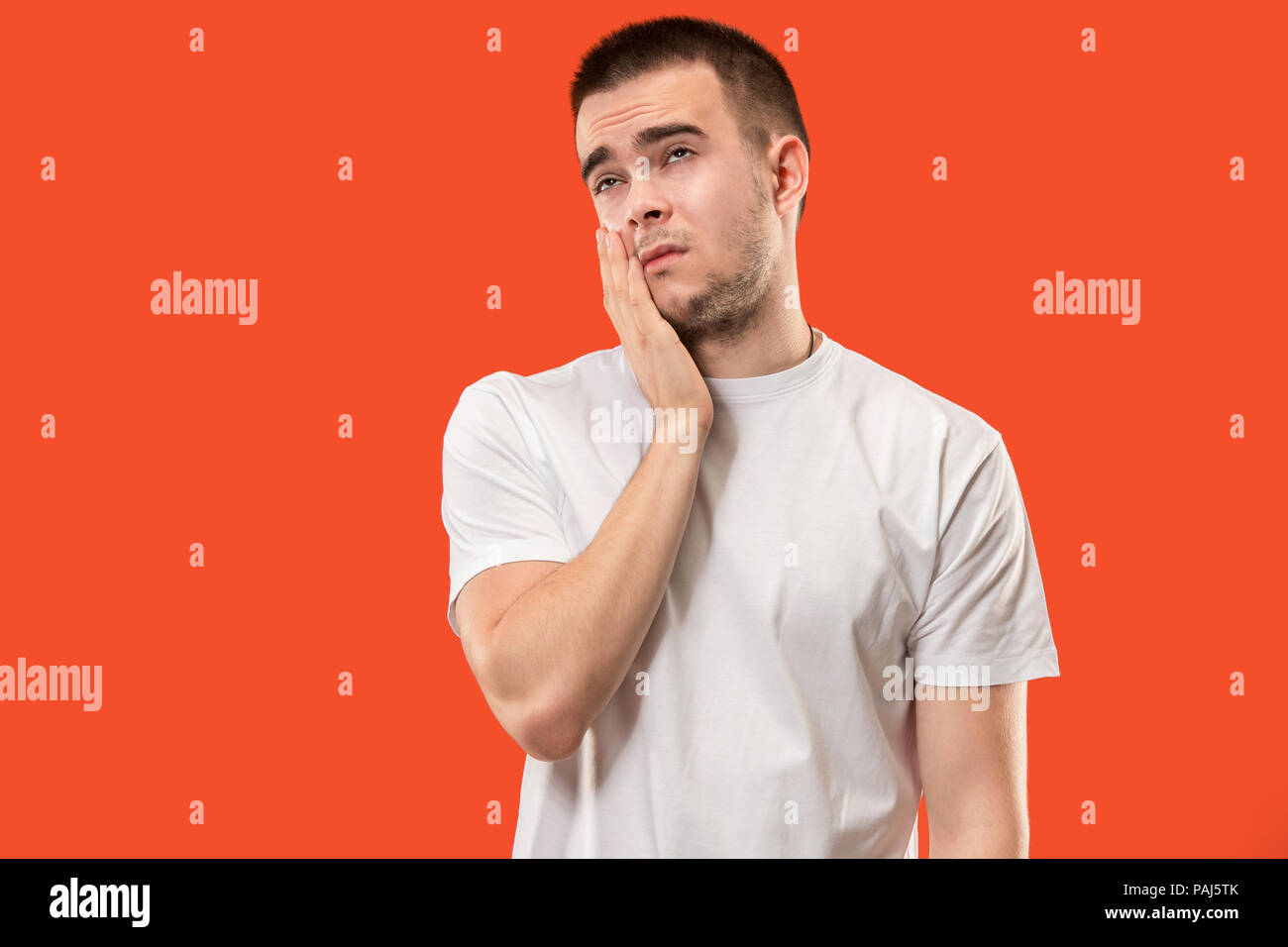 Young man is having toothache. Stock Photo