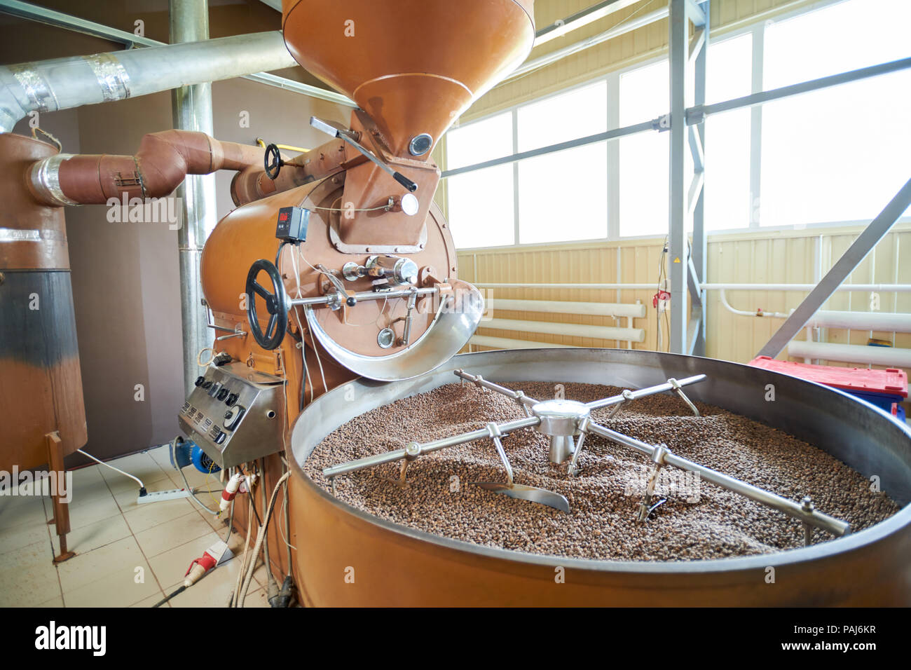 Coffee Roasting Drum Machine in Workshop Stock Photo