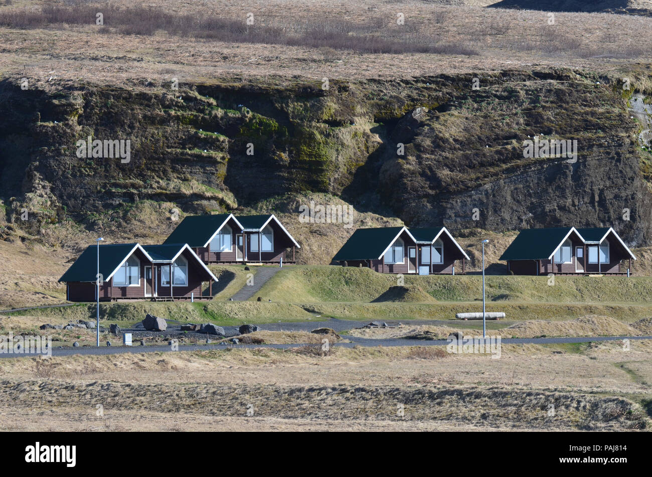 Pretty brown cabins on the coast of Vik Iceland Stock Photo Alamy