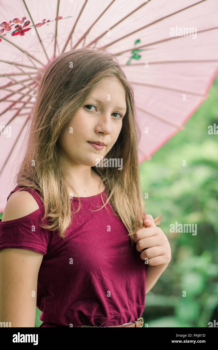 Pre teen girl outdoors Stock Photo