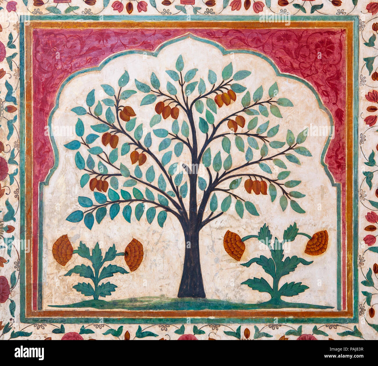 A wall decoration of a fruit tree in the Amber Fort, Jaipur, India Stock Photo