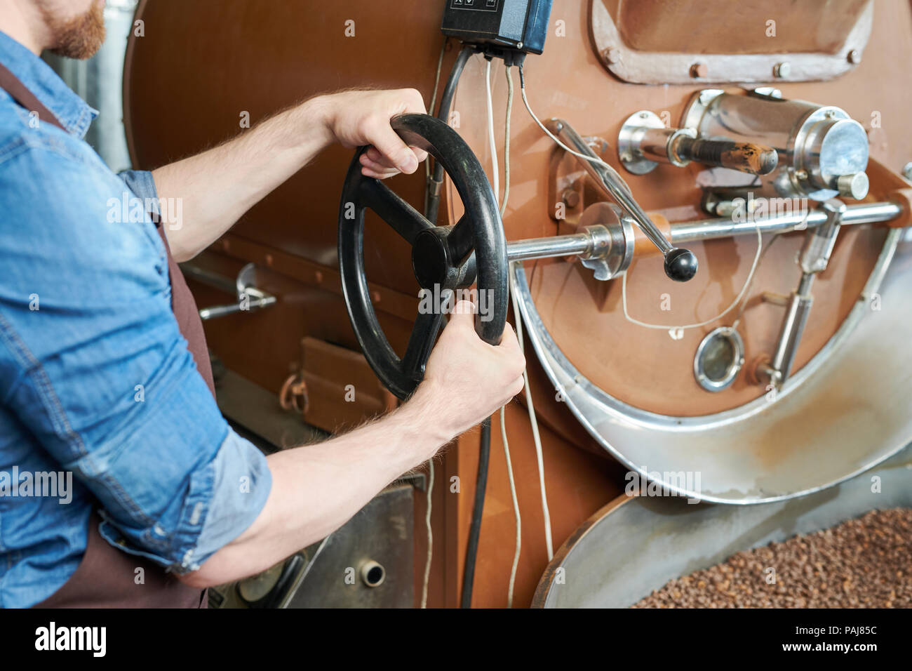 Coffee Roaster using Drum Machine Stock Photo