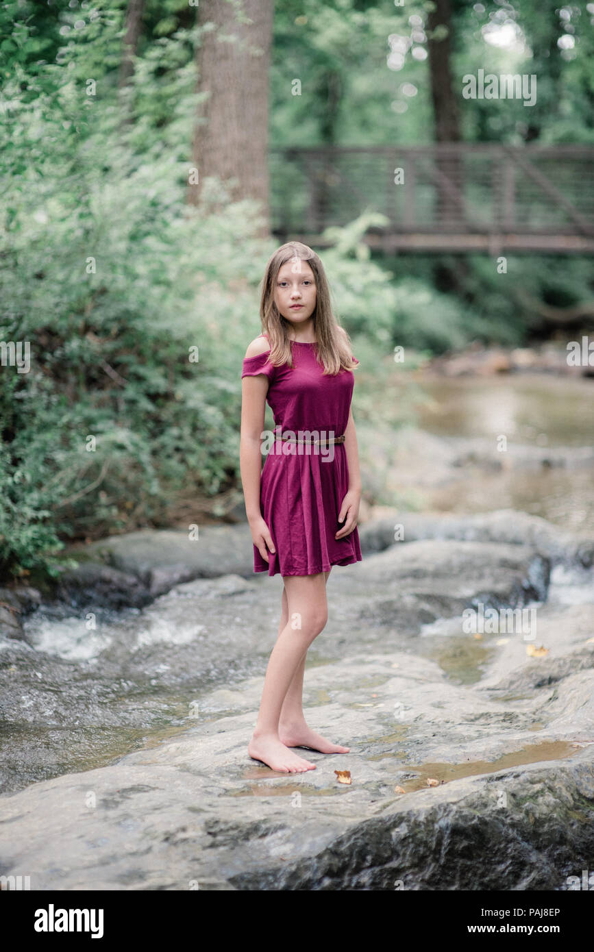 Pre teen girl outdoors Stock Photo